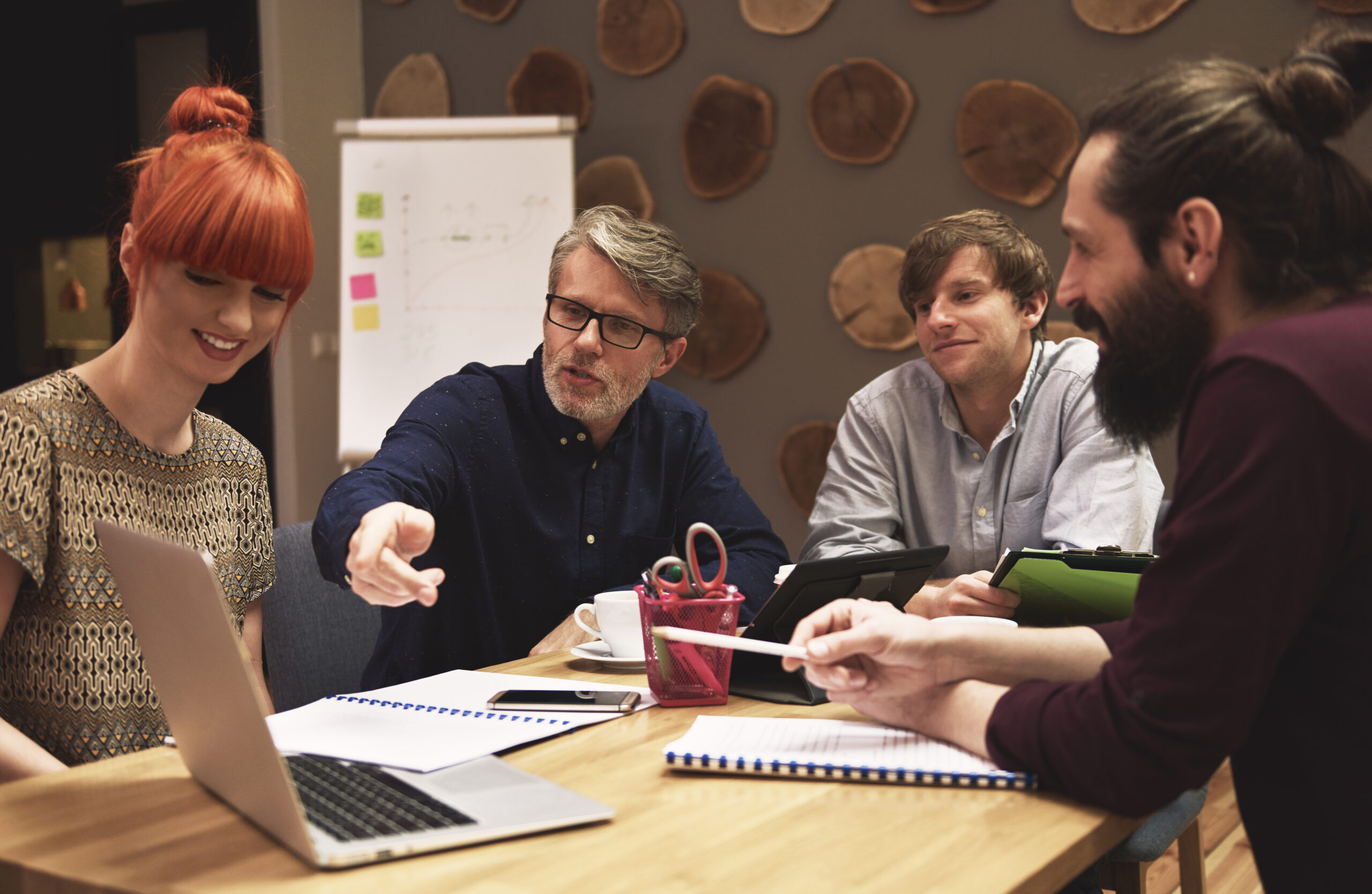 Manager showing idea for finding new customers