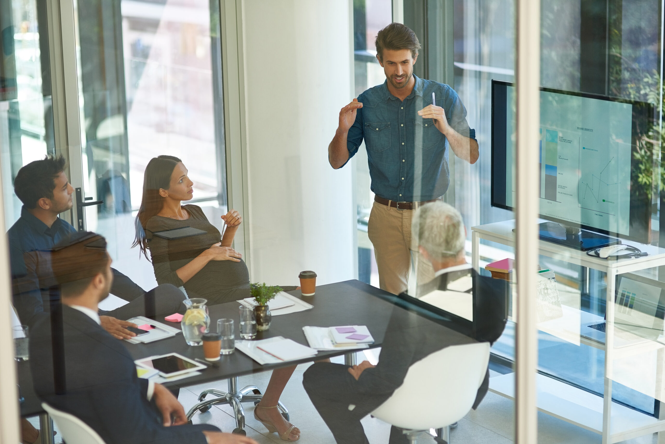 Shot of a corporate businessperson giving a presentation in the boardroom.